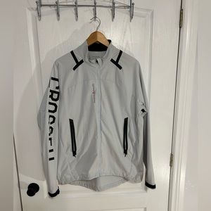 Reebok Santa Cruz crossfit jacket.  Lightweight, light grey and black.